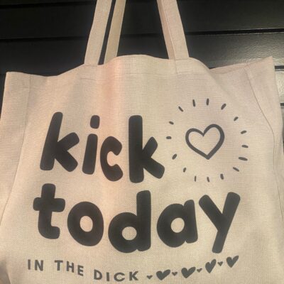 🖕 Kick Today in the Dick — Oversized Tote with Main Character Energy 🖕 Not every day starts with good vibes and green juice. Some days start with “absolutely not,” and that’s exactly when you grab this bag. Whether you’re headed to work, a ritual, or just manifesting a better mood, this unapologetic tote says what we’re all thinking: Today can catch these hands (and possibly feet). Spacious enough for your crystals, snacks, witch kit, emotional baggage, and six unfulfilled prophecies. Strong enough to carry your groceries, your attitude, and your unresolved trauma.