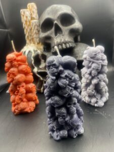 Custom skull tower candles for altars, rituals, or spooky home décor. Hand-poured in your choice of color. Bold, creepy, and perfect for witchy vibes.