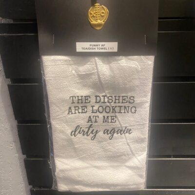 🧼 Trash Talkin’ Towels Collection Your kitchen’s about to get a whole lot sassier. These hilarious dish towels aren’t just for drying—they’re for serving looks, starting conversations, and keeping your sarcasm quota on point. Perfect for gifting, side-eyeing dirty dishes, or simply expressing your beautifully chaotic personality one wipe at a time. Made from soft, absorbent material and stamped with bold black text and brutal honesty, these towels were made for people who laugh through the mess.