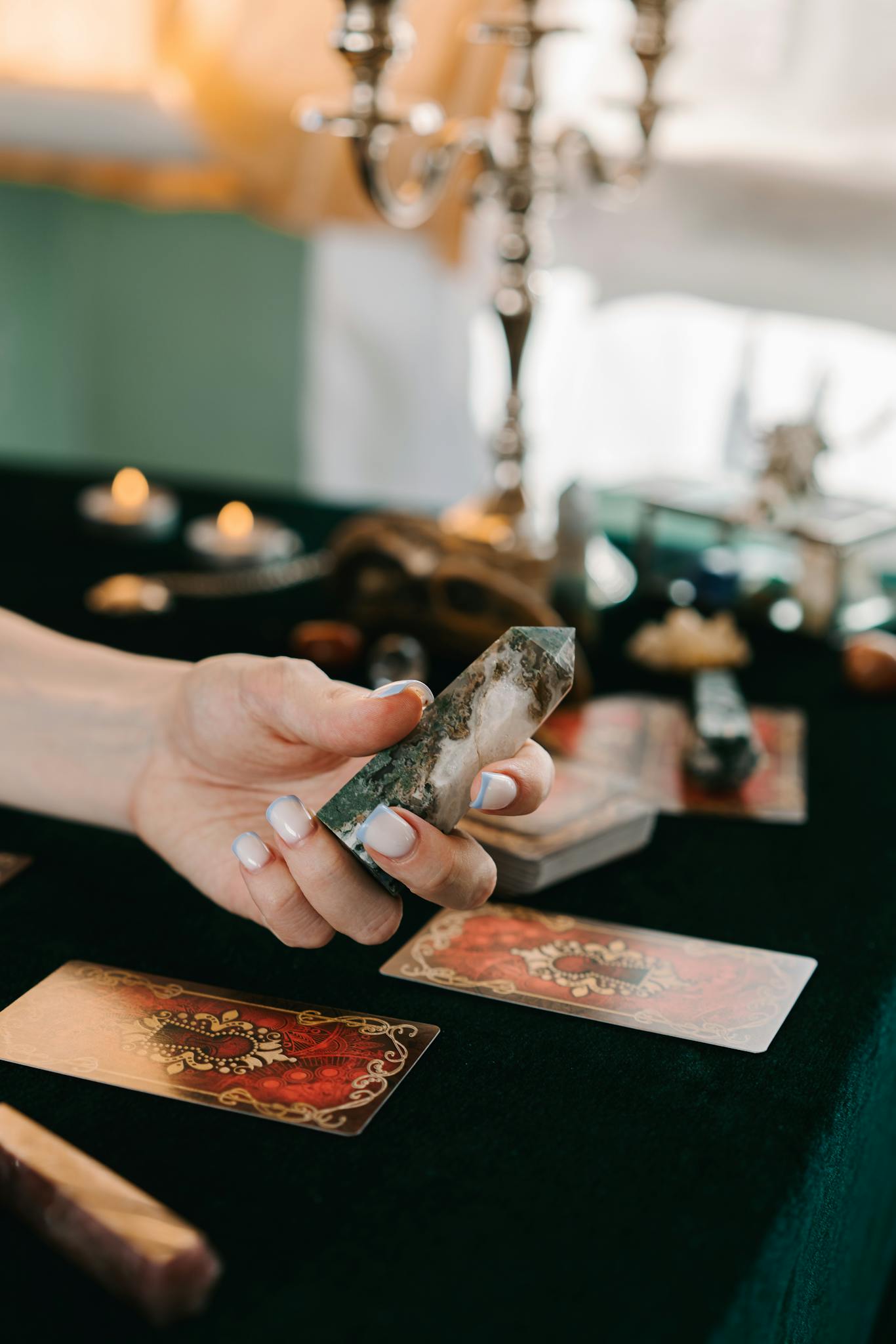 A serene scene of tarot reading enhanced by crystal healing tools.