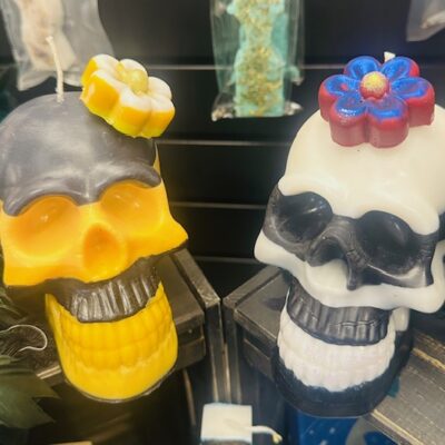 Custom Flower Skull Candles by Trashmagick Alchemy. Handmade with endless options: glitter, color-changing wax, layered colors, bold scents & unique designs.